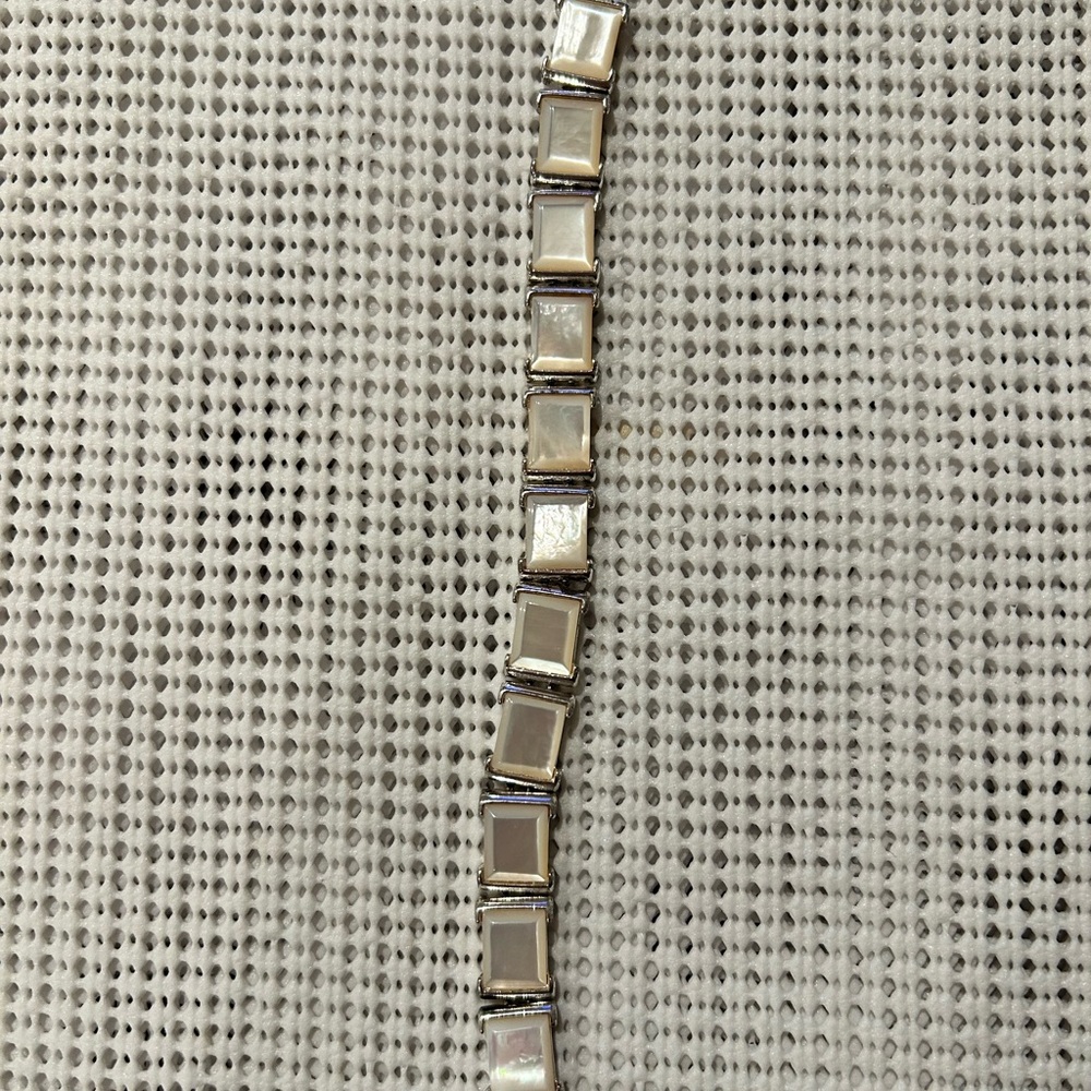 Stunning Monet Mother of Pearl Bracelet. Length is 7 inches.